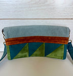 La pochette bleu-vert