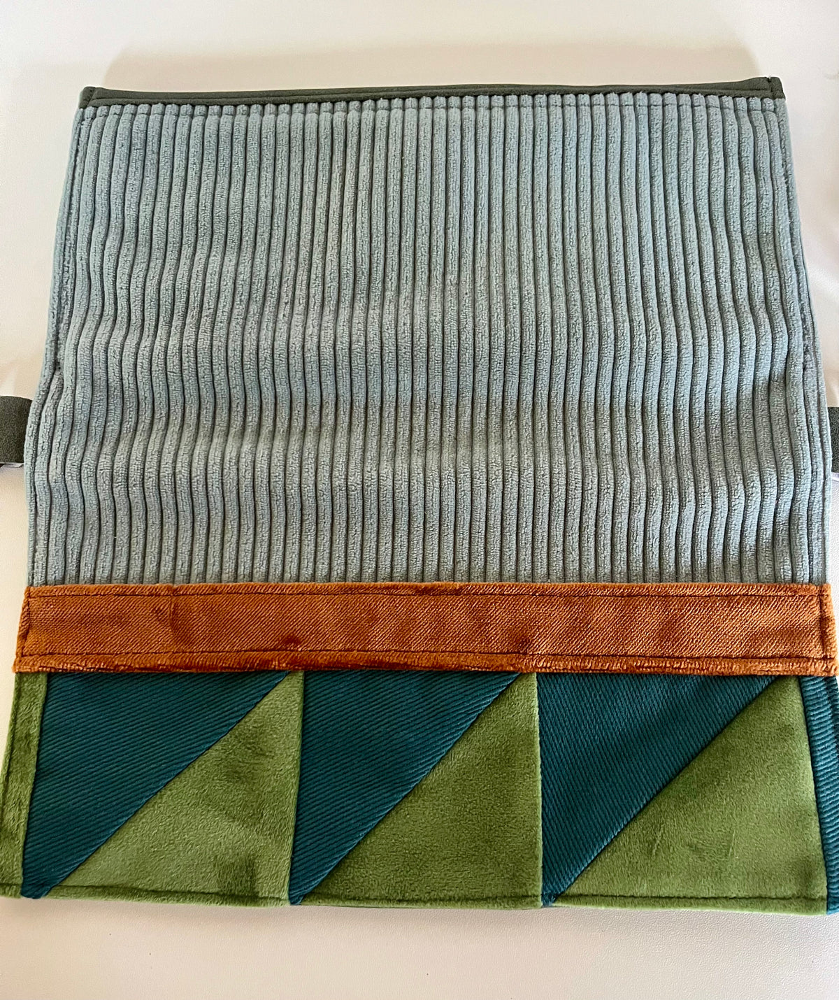 La pochette bleu-vert