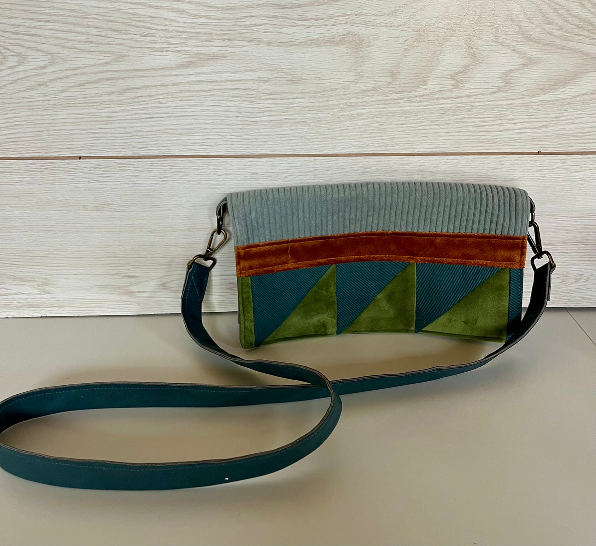La pochette bleu-vert