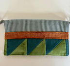 La pochette bleu-vert