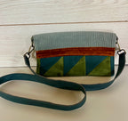 La pochette bleu-vert