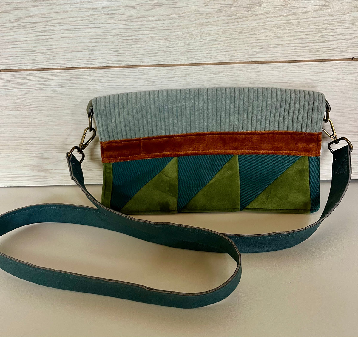La pochette bleu-vert