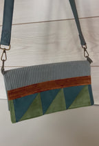 La pochette bleu-vert